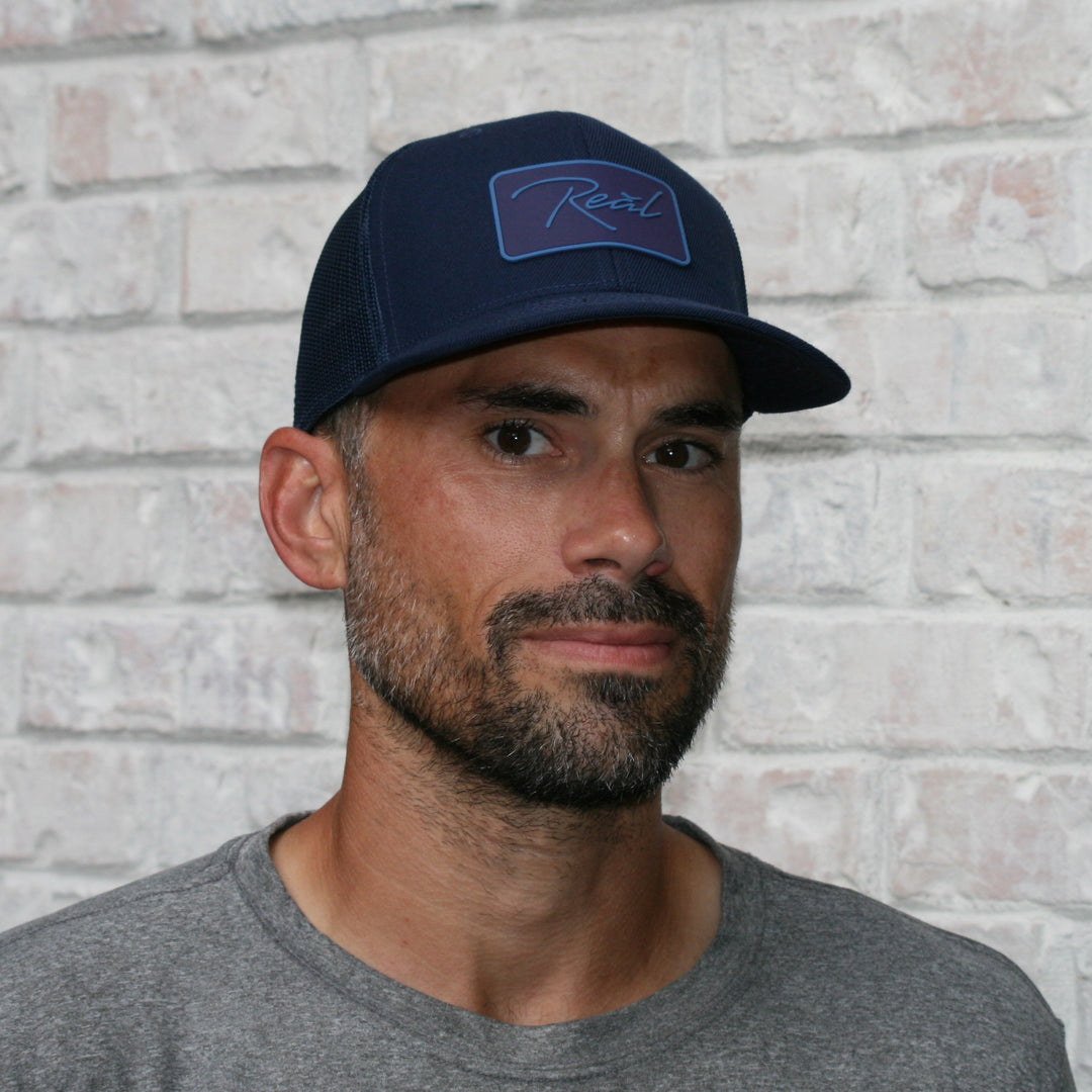 Reãl Trucker Hat