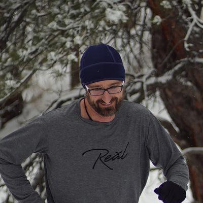 Double sided microfleece beanie offers warmth while moving moisture to keep you from getting cold.  Perfect for running or under a cycling helmet.