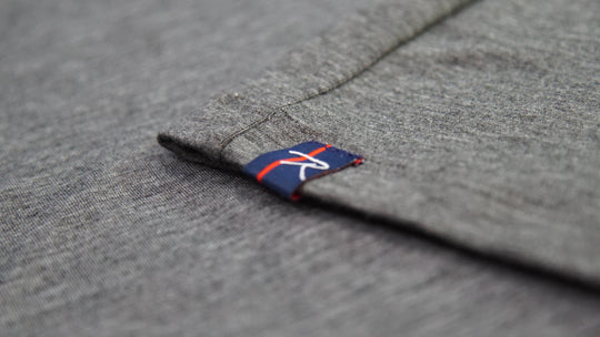 The heather grey of the Men's Blue Ridge shirt suggests comfort. The Poly/Lycra/Tencel blended fabric delivers the comfort. You can wear this shirt during your run, before your workout or race. It is best worn while making the walk up to the podium afterwards.