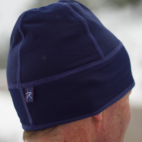 Double sided microfleece beanie offers warmth while moving moisture to keep you from getting cold.  Perfect for running or under a cycling helmet.